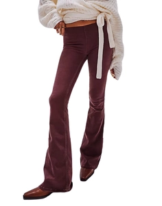 Detail of slim-fit burgundy flare pants for women styled with a cream knit top and brown shoes