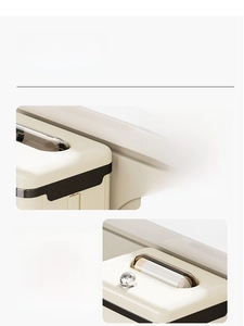 Detail of wall-mounted kitchen bin with built-in top storage for trash bags