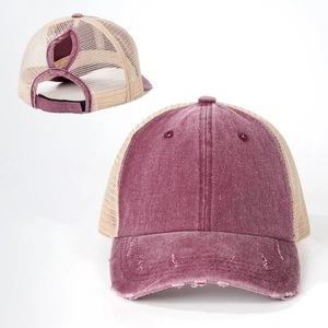 Close-up detail of distressed purple ponytail baseball cap with breathable beige mesh back