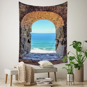 Detail of bohemian archway seascape tapestry showing ocean view and stone wall texture