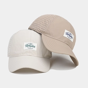 Breathable quick-dry baseball cap with laser-cut ventilation and vintage woven label