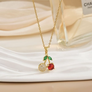 Golden cherry pendant necklace with red crystals and sparkling white zircons