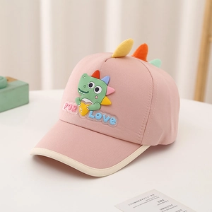 Close-up of pink kids baseball cap with 3D cartoon dinosaur and FOR LOVE text detail