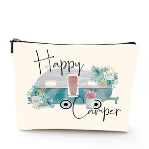 Detail of Happy Camper linen makeup bag with vintage camper and floral illustration