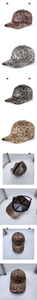 Detail of leopard print baseball cap featuring metallic sheen and adjustable metal buckle