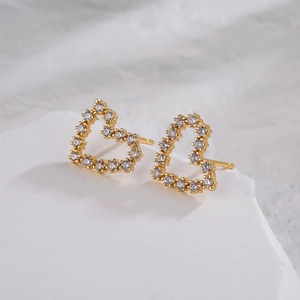 Micro-paved heart earrings in 18K gold plated copper with cubic zirconia stones