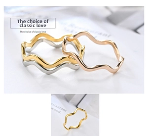 Three-color wavy titanium steel rings in gold, silver and rose gold stackable finishes