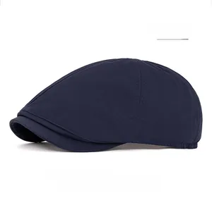 Detail view of double stitching on navy quick-dry fabric flat cap for a casual look