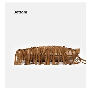 Detailed bottom view of brown tassel crossbody bag showing long fringe and oval base