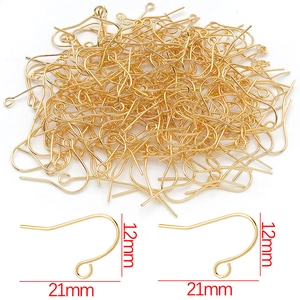 Macro detail of gold-plated 21x12mm ear hooks for DIY jewelry making accessories