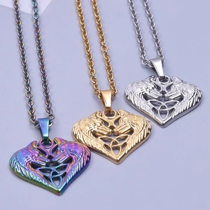 Three-color heart wolf pendant necklaces with Celtic knots in gold, silver, and iridescent finish