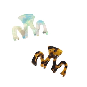 Elegant wavy acetic acid hair clips in blue marble and classic tortoiseshell patterns