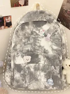 Japanese style tie-dye canvas backpack for women featuring cute bear pins and charms