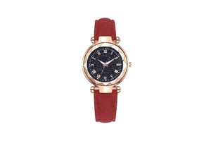 Close-up of faceted rose gold bezel and starry blue dial with Roman numerals