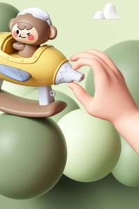 Detail of yellow cartoon airplane toy with monkey pilot and interactive hand touch scene