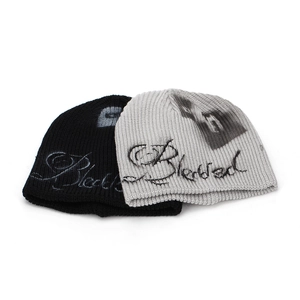 Street style graffiti knit beanie with Blessed lettering in black and light grey colors