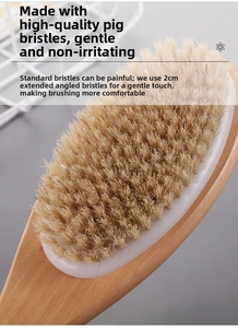 Detail of 2cm natural boar bristles on a long-handle wooden bath body massage brush