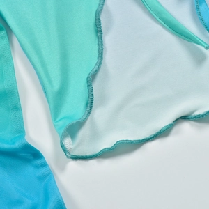 Detailed macro view of cyan blue mesh fabric with professional ruffled edge stitching