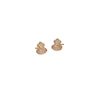 Elegant gold plated gourd stud earrings with cubic zirconia and bow tie details