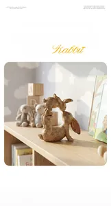 Detail of resin rabbit sculpture with wood-like texture for home nursery decor