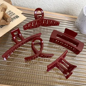 5-piece set of elegant burgundy resin hair claws in various geometric shapes for women