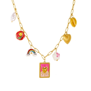 Macro view of gold necklace with enamel charms, baroque pearl and heart love pendant
