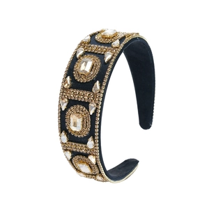Luxury Baroque headband with gold crystals and geometric patterns on black fabric base