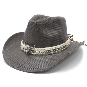 Western dark brown woven cowboy hat with bull skull metal emblem and gold studs décor