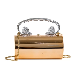 Rose gold cylindrical acrylic evening bag with silver lion head handle and chain strap