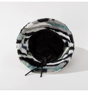 Top view of plush bucket hat showing camo faux fur texture and adjustable inner lining
