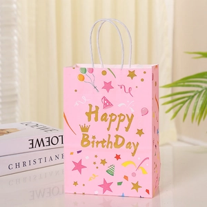Pink Happy Birthday gift bag with white twisted paper handles and festive party illustrations
