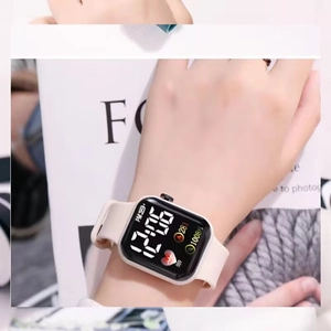 Chic white square LED digital watch with heart rate display worn on a wrist for sport