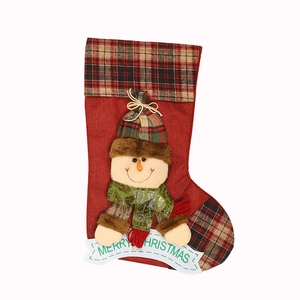 Large red Christmas stocking with 3D snowman doll and plaid cuff for holiday gift bag