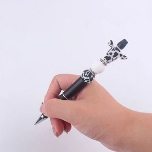 DIY creative cow bead pen with black barrel and decorative cow print silicone beads