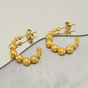 Vintage 18k gold plated stainless steel bead hoop earrings with elegant mirror reflection