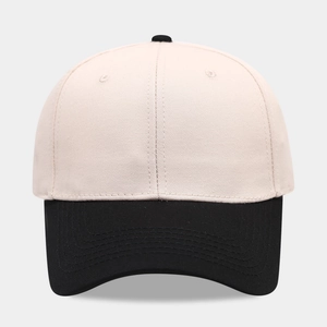 Detailed view of dual-color cotton baseball cap with khaki crown and black brim contrast