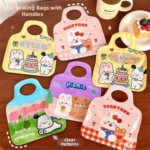 Detailed view of colorful cartoon self-sealing bags with cute animals and clear windows