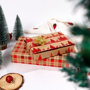 Premium Christmas wrapping paper with red foil reindeer and plaid patterns.