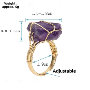 Detail of adjustable gold wire wrapped ring with a natural raw purple amethyst stone
