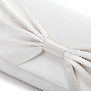Detail of white satin butterfly clutch showing elegant pleated bow craftsmanship