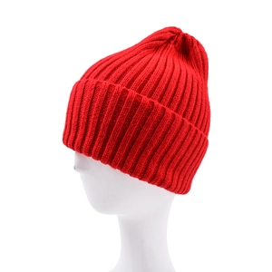 Close-up of vibrant red rib-knit texture and fold-over cuff on warm winter beanie