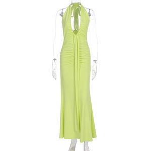 Detailed view of neon ruched halter neck maxi dress with side drape and fishtail hem
