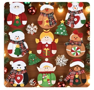 Detailed flat lay of assorted felt Christmas ornaments on a dark wooden background