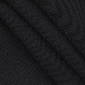 Close-up of premium black knitted fabric texture showing fine weave and soft material