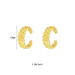 Detail view of 14mm golden geometric ear cuffs with 1.8g weight specifications