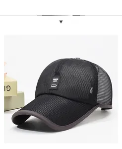 Detail of black mesh baseball cap with breathable honeycomb fabric and mini logo patch