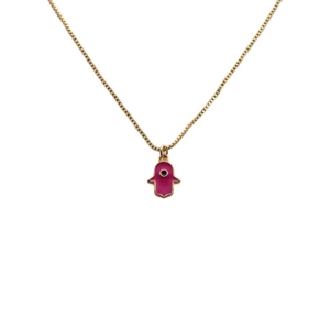 Gold Hamsa hand necklace with pink pendant and blue evil eye detail on white background