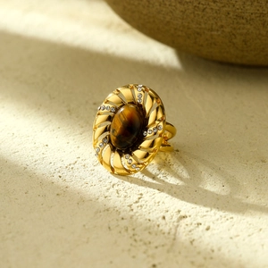 Vintage gold-plated stainless steel ring with oval tiger eye stone and diamond accents