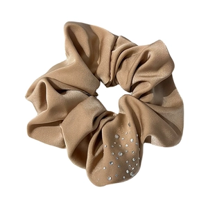 Elegant champagne satin scrunchie with sparkling rhinestones for ponytail styling