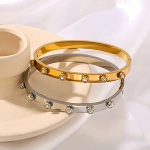 Set of 18K gold and silver plated bangles with inlaid round zircon stones for women
